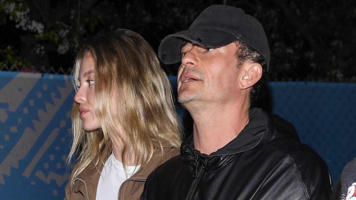 Super Bowled over! Orlando Bloom, 49, takes bikini model, 28, to game... as Google boss, 70, 'dates German aged 27'