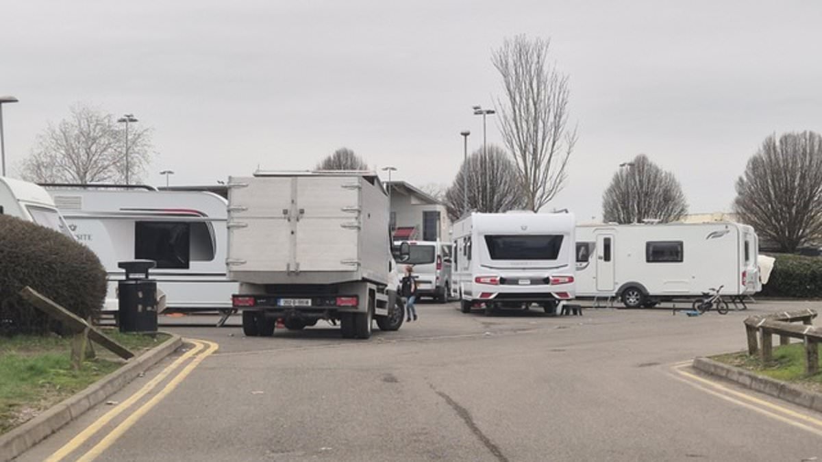 Large group of travellers set up home on beauty spot car park as council vows to take action