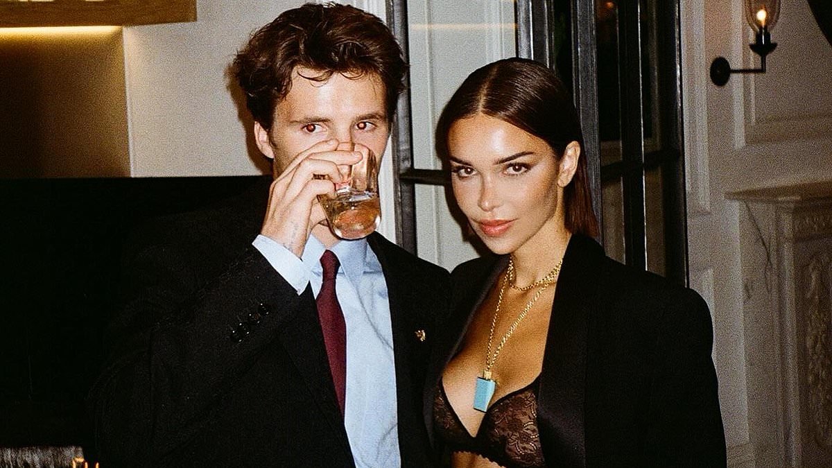 Cruz Beckham, 20, and girlfriend Jackie Apostel, 30, do a jigsaw of THEMSELVES after spending Christmas at his family's Cotswolds home