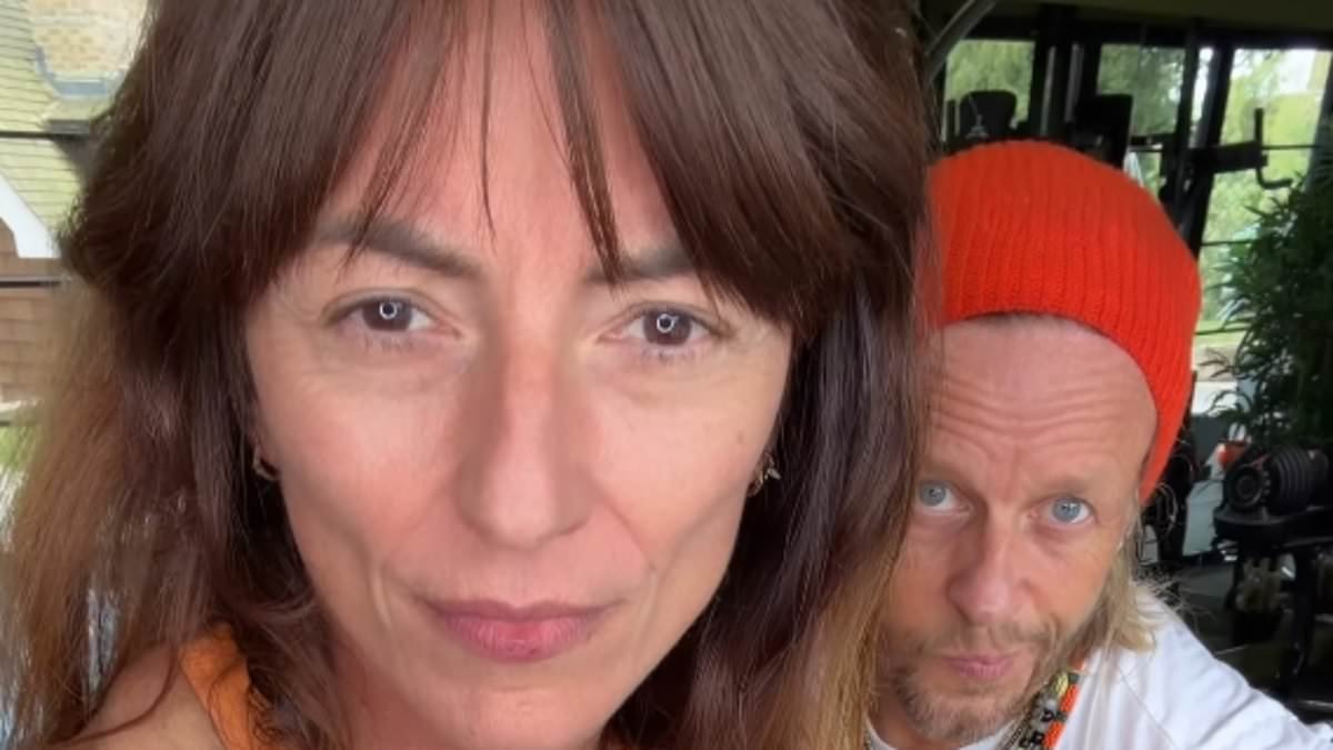 Davina McCall, 58, displays her fit physique in a crop top as she works out with husband Michael Douglas after getting the all clear from breast cancer