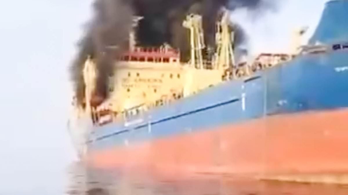 Oil tanker bursts into flames after being hit by Iranian drones in Straits of Hormuz as markets brace for price surge in aftermath of attacks