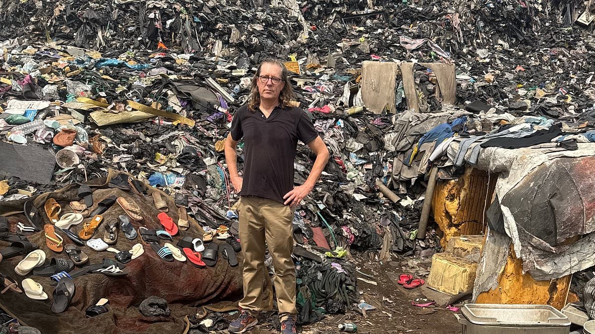 THIS is where the old clothes you give to charity or carefully put in 'recycling bins' REALLY end up... (Squint hard enough and you may see your M&S bra in this fetid mound)