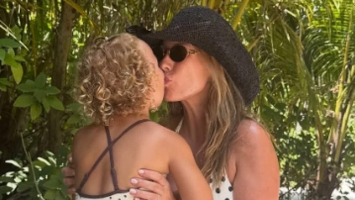 Bikini-clad Kate Ferdinand shares sweet snap with daughter Shae in Portugal after fleeing Dubai with husband Rio and their kids
