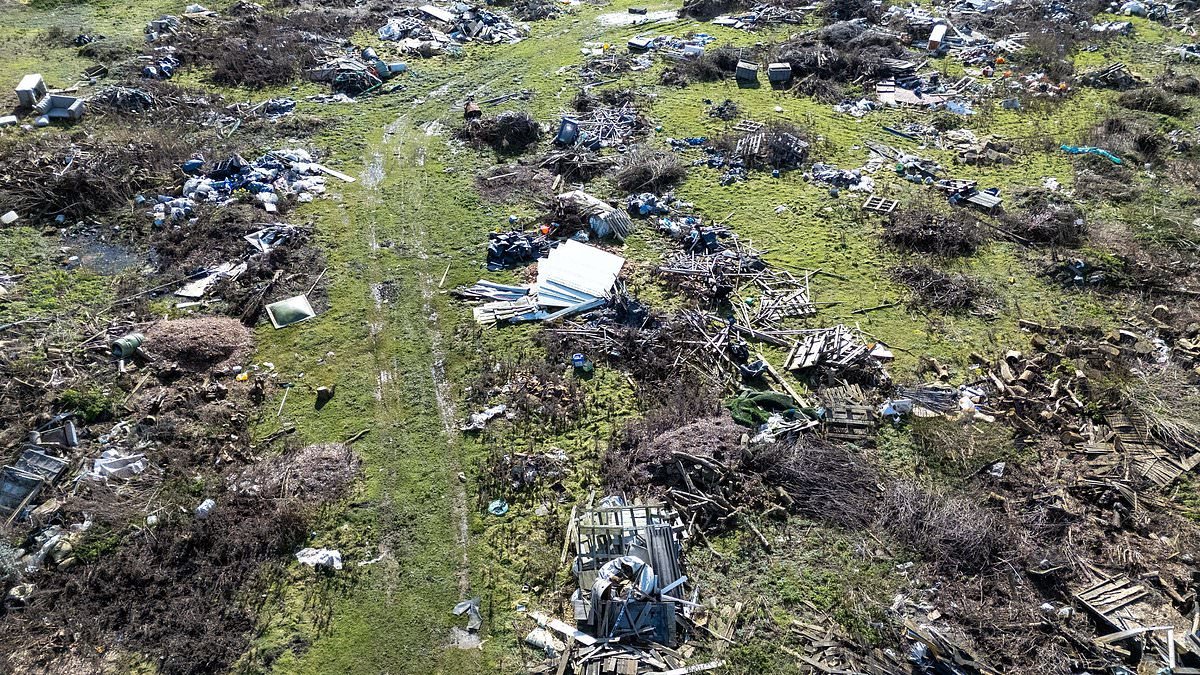 Sea of fly-tipped waste is found dumped next to traveller site that is just metres from a recycling centre