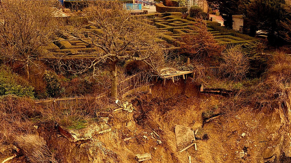 Drone pictures show Britain's eroding coastline edging closer to the country's oldest theme park after devastating landslips