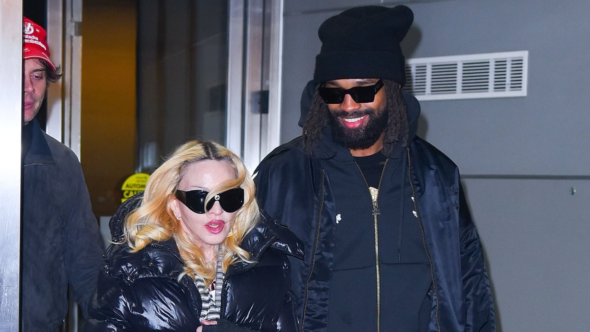 Madonna, 67, and boyfriend Akeem Morris, 29, return to US from family getaway as she voices support for Iran protesters