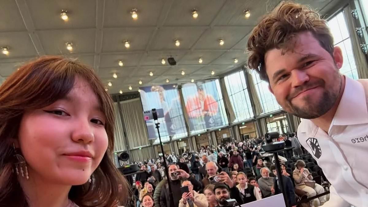 Chess player who took selfie with World No.1 before he snitched on her for using phone THANKS him and insists she has 'no hard feelings'