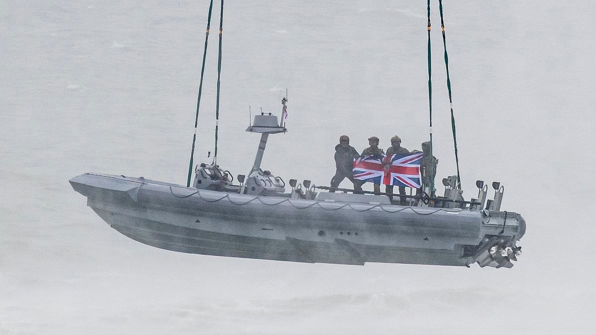 Special Boat Service commandos raise the Union Flag after incredible high-speed helicopter training exercise
