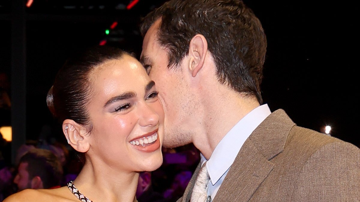 Dua Lipa and fiancé Callum Turner put on a loved-up display at the Rosebush Pruning premiere during Berlin's International Film Festival