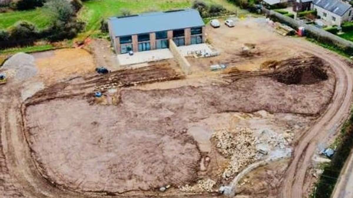 Developer accused of causing planning 'apocalypse' in quaint Cornwall village after converting barn into £1m newbuild homes