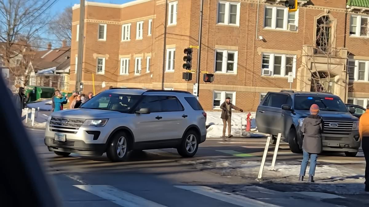 Damning new video shows Alex Pretti running at ICE agents and screaming in their faces before smashing feds' tail light