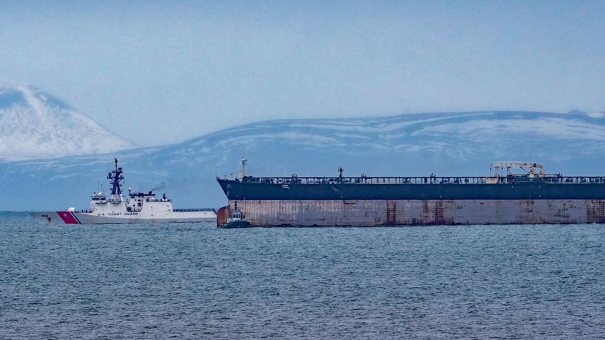 Russian shadow fleet oil tanker drops anchor three miles off coast of Scotland days after it was seized in US commando-style raid with help of British military