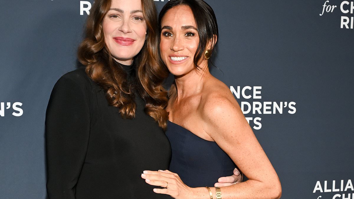 Meghan Markle dons strapless £3,000 Ralph Lauren gown for LA charity bash to 'project inner confidence' amid reports of Netflix fall-out - as stylist reveals Duchess' fondness for shoulder-baring dresses