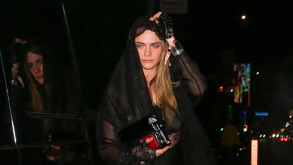 Cara Delevingne turns heads in a sheer lace hooded ensemble as she enjoys a night on the town at The Birds Street Club in West Hollywood