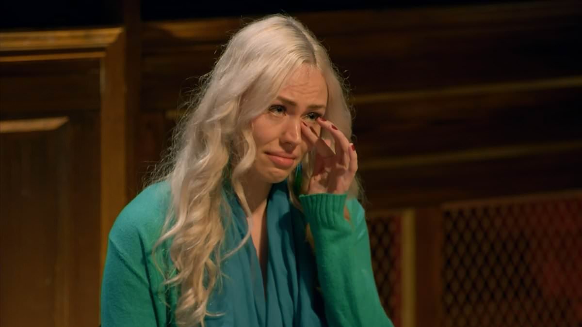 The Traitors contestant Ellie breaks down in tears as she is banished during emotional roundtable - and leaves the group shocked with her huge secret