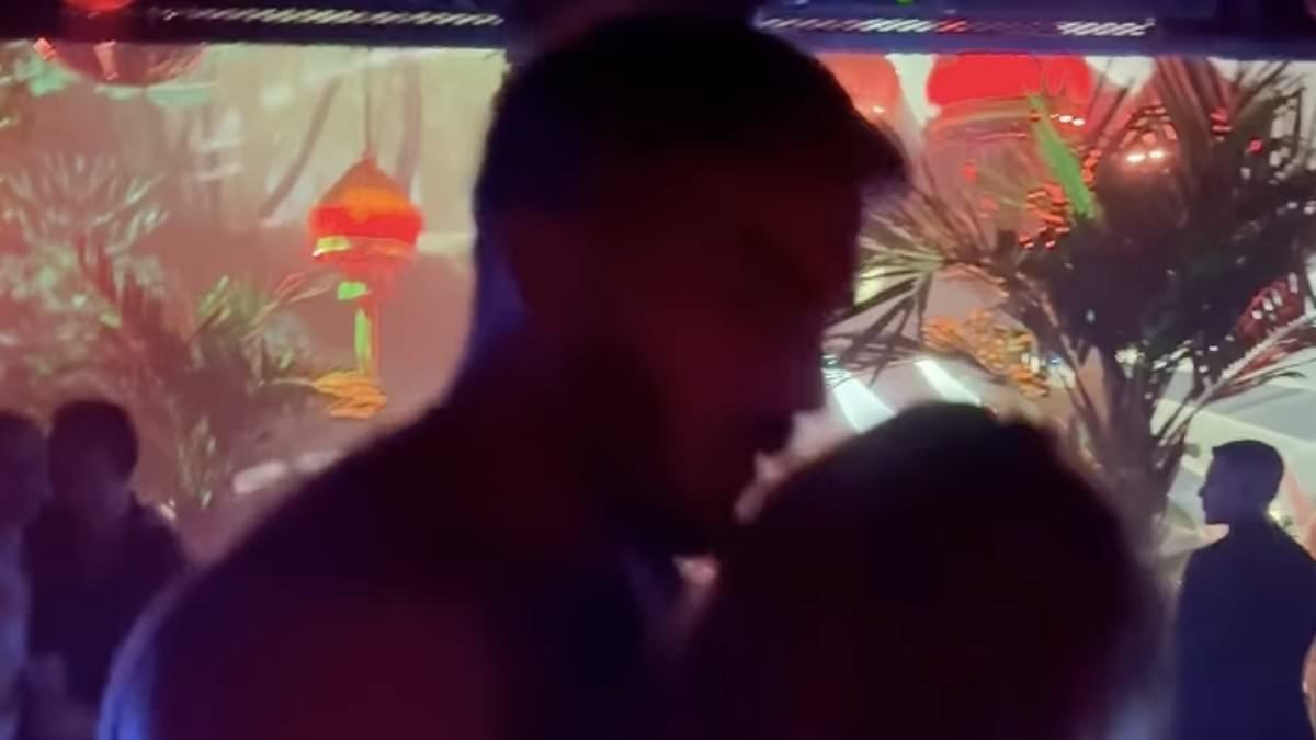 Olivia Attwood pokes fun at the Beckham drama as she wraps her legs around a man in hilarious clip - while Victoria dancing memes send the internet into meltdown