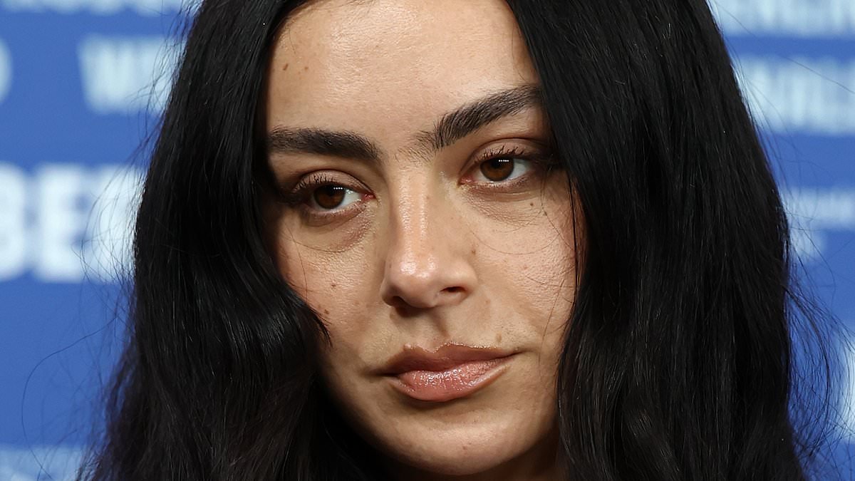 Charli XCX says she's 'definitely come close' to the 'breakdown' her on-screen alter-ego suffers in new movie The Moment as she confesses she's been 'training for it her entire life'