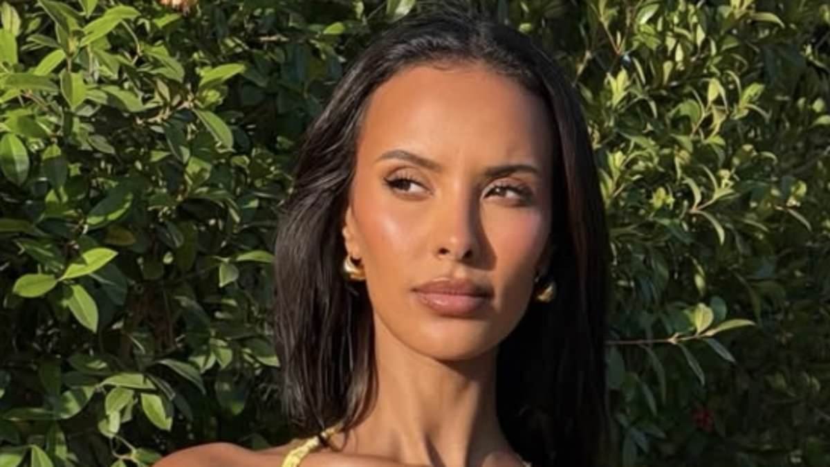 Maya Jama flaunts her washboard abs in a crochet bralette and midi skirt as she poses for sizzling snaps in South Africa for Love Island: All Stars