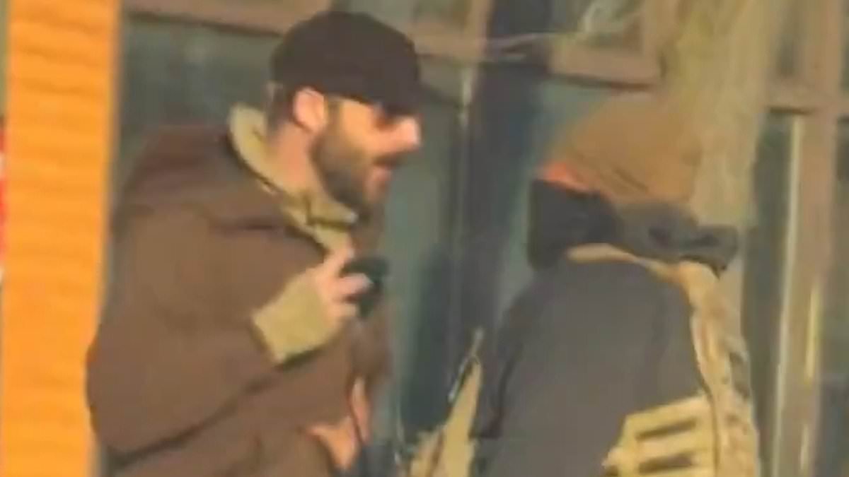 Dispute over gun at center of deadly shooting breaks out as feds claim weapon was 'brandished'.. but they appeared to remove it from victim well before opening fire