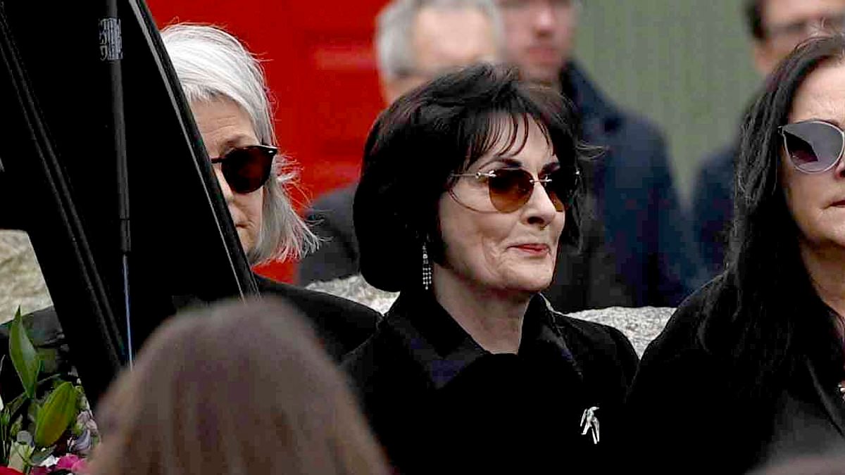 Reclusive singer Enya leads mourners at funeral of her Clannad vocalist sister Moya Brennan, 73, in Co. Donegal as U2 frontman Bono and Andrea Corr pay their respects