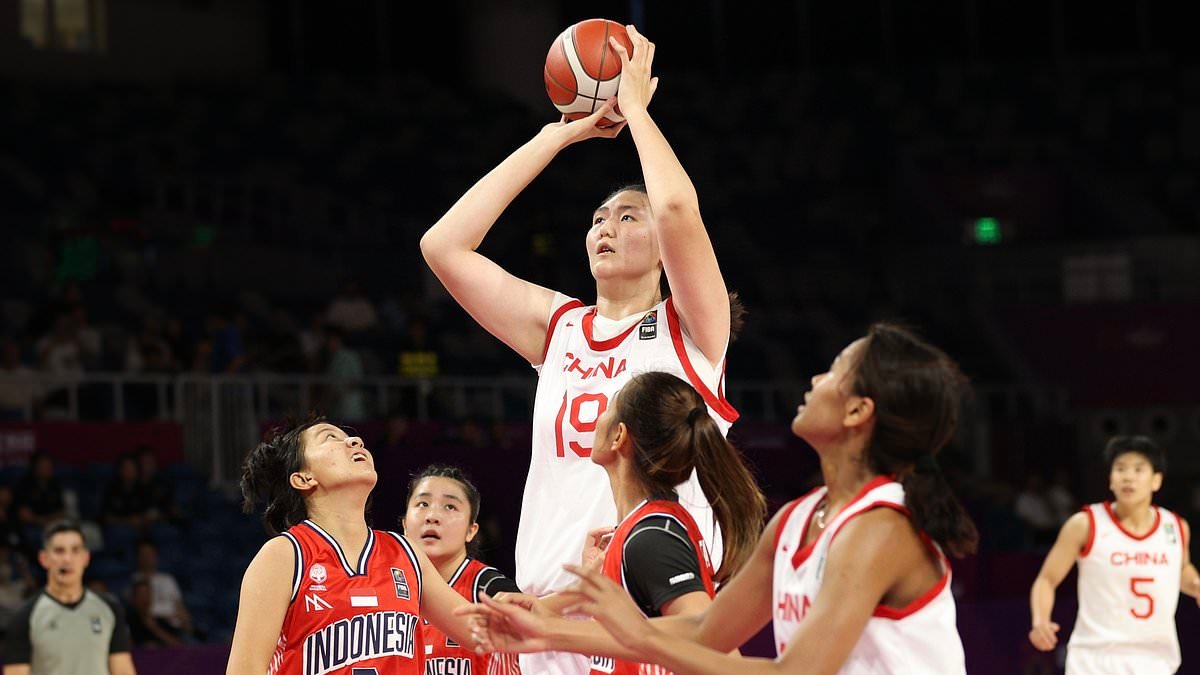 Towering 7ft 3in Chinese basketball player destroys WNBA rivals in her pro debut at only 18
