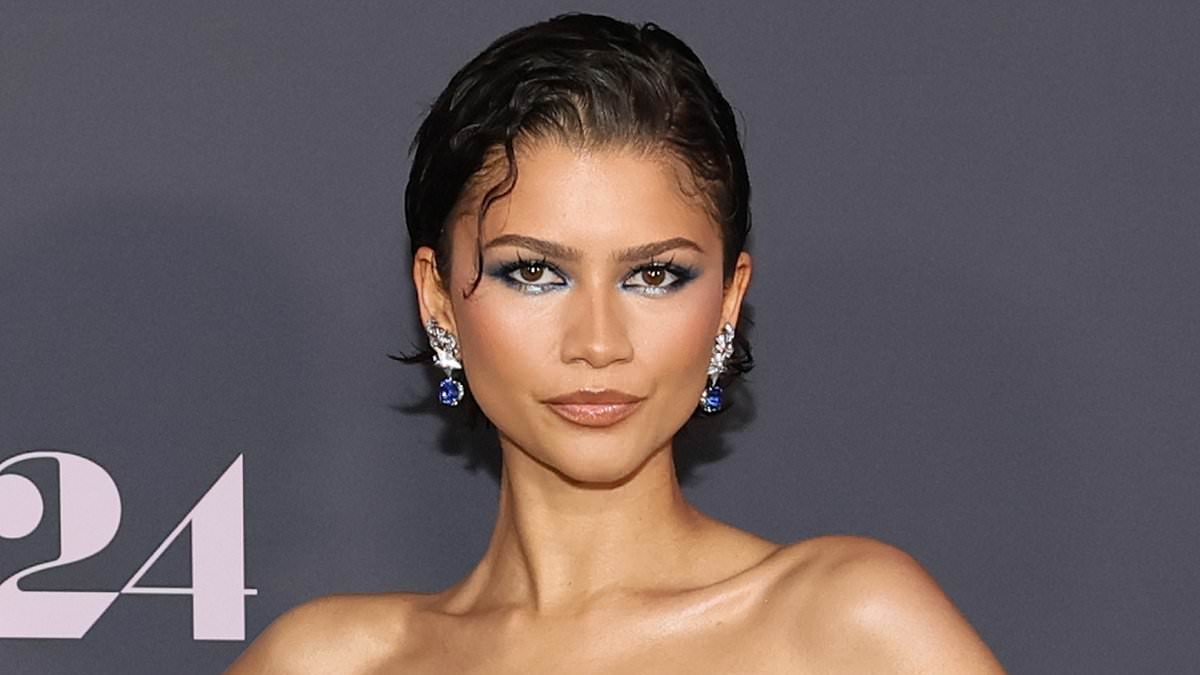 Zendaya wows in feathered gown featuring 27 shades of 'something blue' as she joins Robert Pattinson at The Drama premiere in NYC
