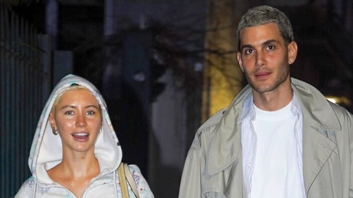 Iris Law is all smiles as she heads out with fellow model Fai Khadra during Milan Fashion Week as the pair sport matching bleached hair