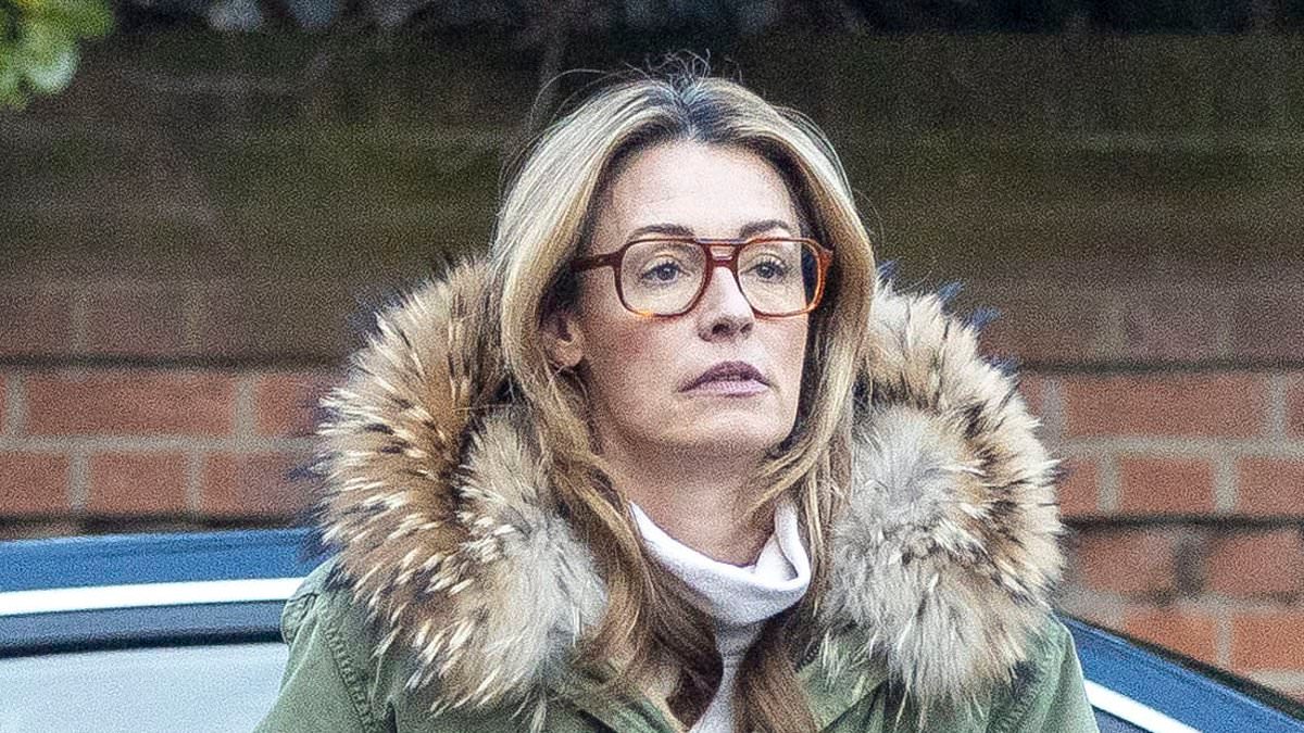 Cat Deeley goes makeup free in a pair of stylish oversized glasses for a relaxed day out in north London