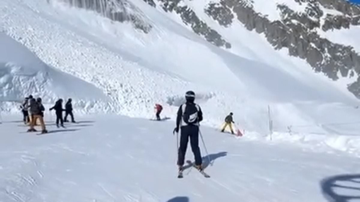 Terrifying moment avalanche sweeps away skiers as huge wall of snow crashes over piste at top French ski resort - before victims are found alive buried up to their necks