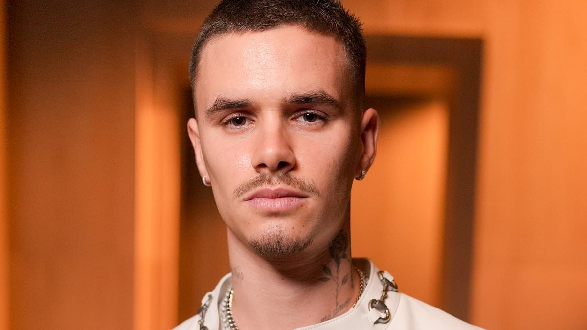 1-0 to Romeo Beckham! Brooklyn's brother posts pointed football video just minutes after Nicola Peltz says how much her husband 'loves playing soccer with HER siblings' following the family feud