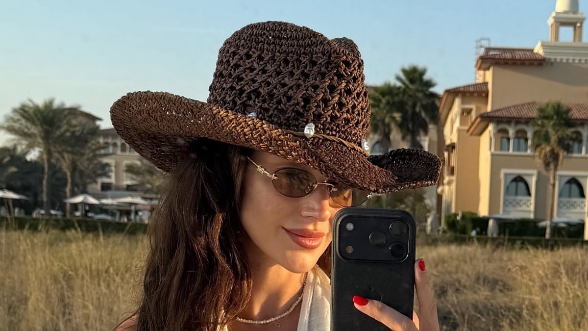 Michelle Keegan slips into a plunging cream dress as she shares a sweet snap of baby daughter Palma on £2k-per-night winter getaway