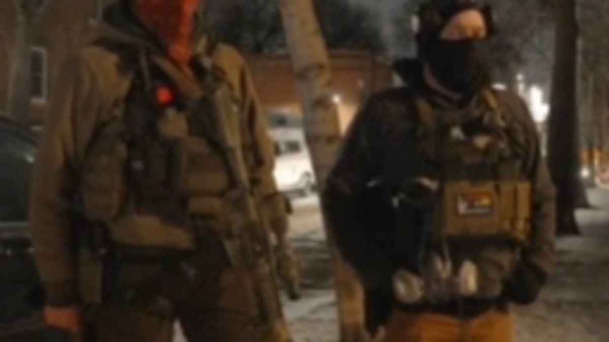 Trump on the verge of backing down to immigration protesters as armed men are seen on the streets of Minneapolis after Alex Pretti shooting