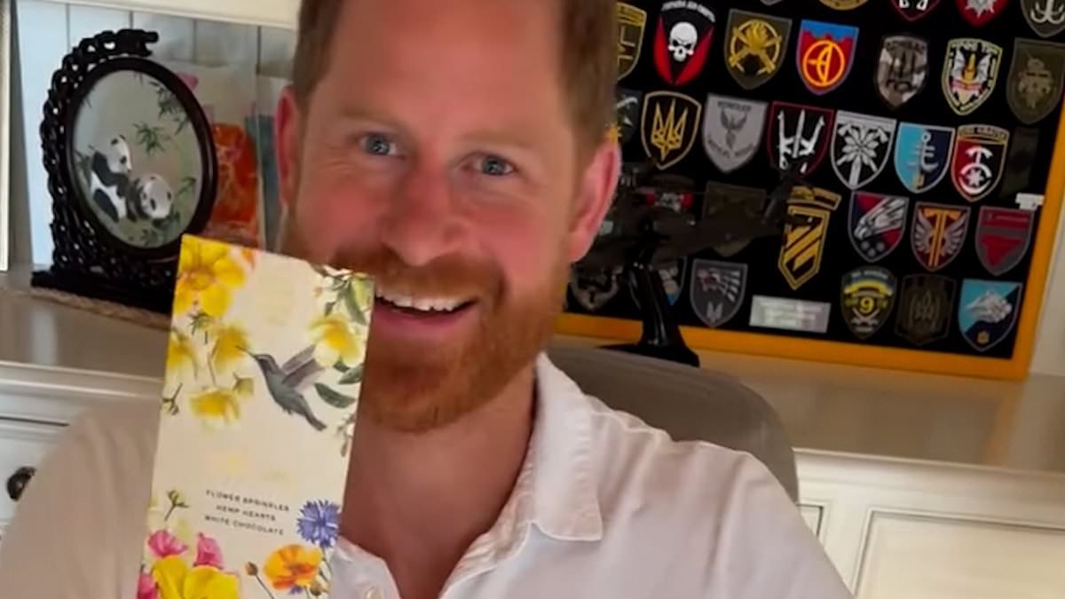 A peek inside Prince Harry's 'man cave': Duke of Sussex offers a glimpse into his private study - complete with military badges, a model helicopter and ornate candles