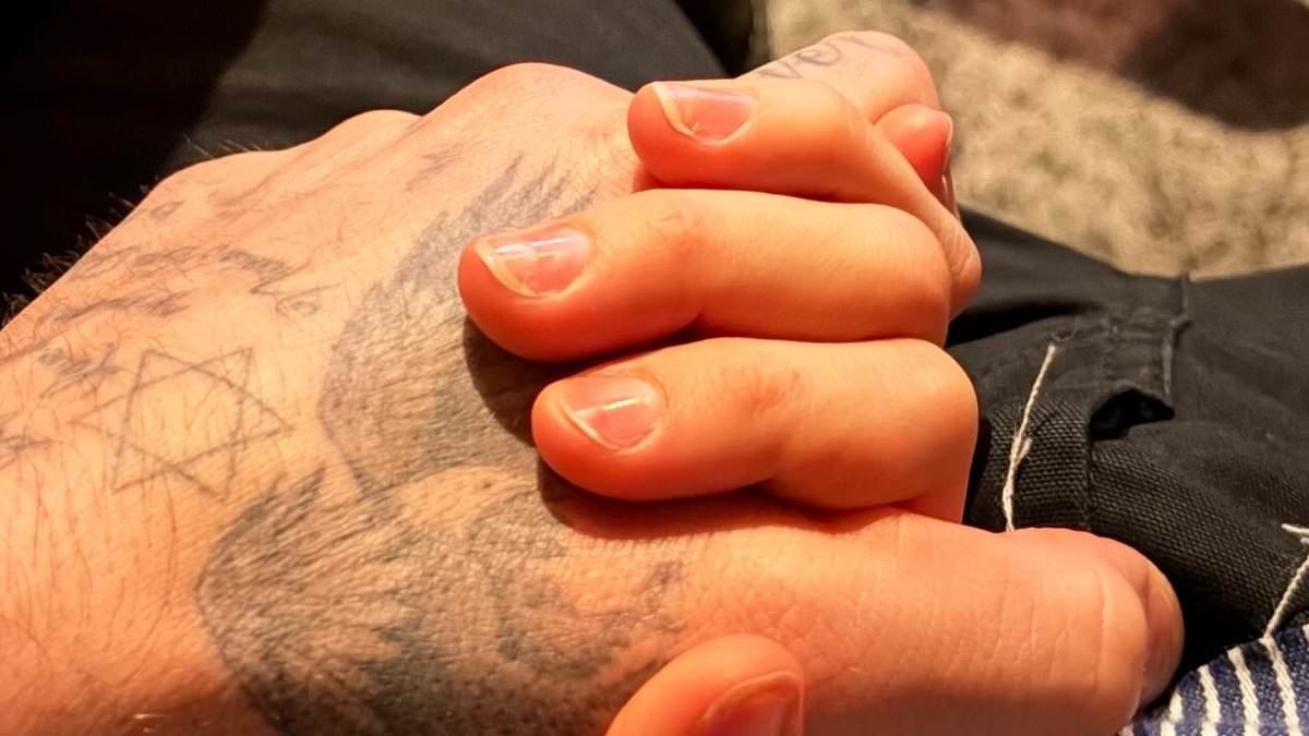 Brooklyn Beckham shows off his tattoo tribute to Nicola Peltz's Jewish heritage as the couple hold hands - after removing inking in honour of his dad David amid ongoing estrangement