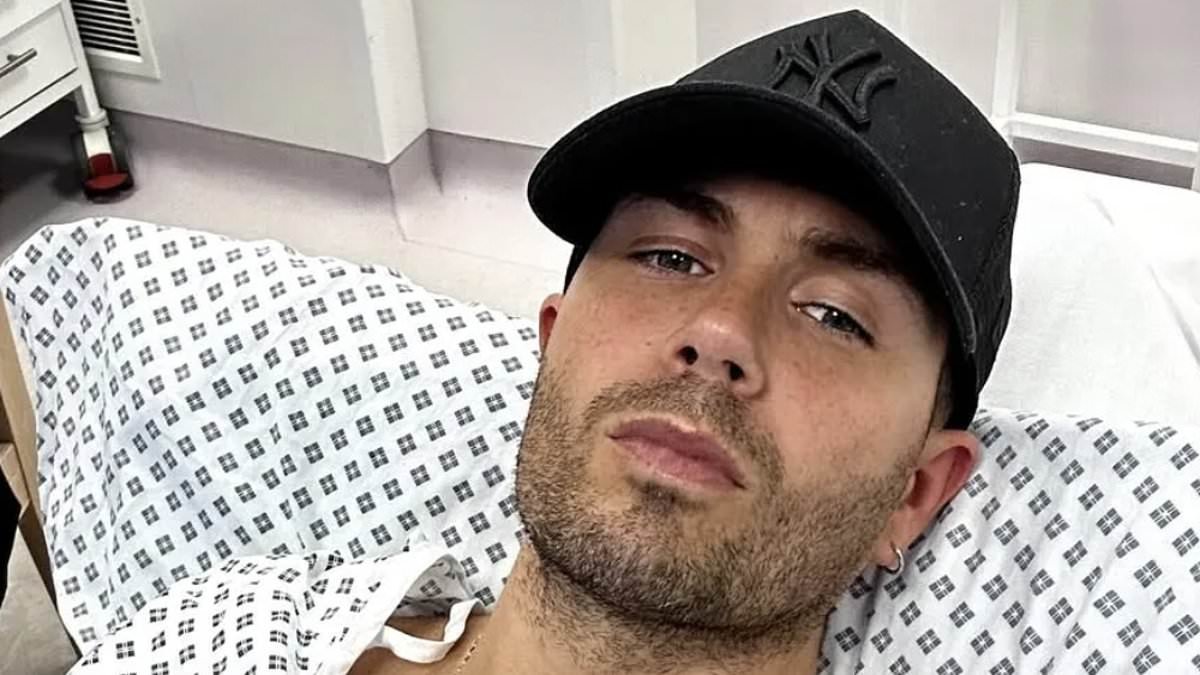 Max George is rushed to hospital in the middle of the night as he shares photo from A&E after having pacemaker fitted
