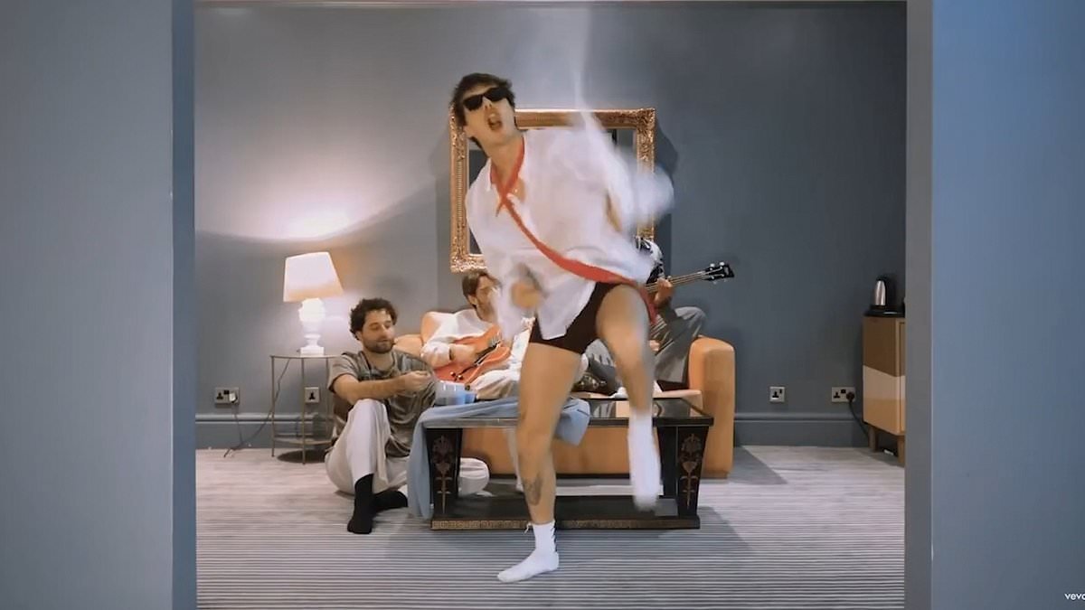 Cruz Beckham strips down to his shirt and boxers for wacky new music video about 'self‑love, acceptance and starting afresh' amid family feud