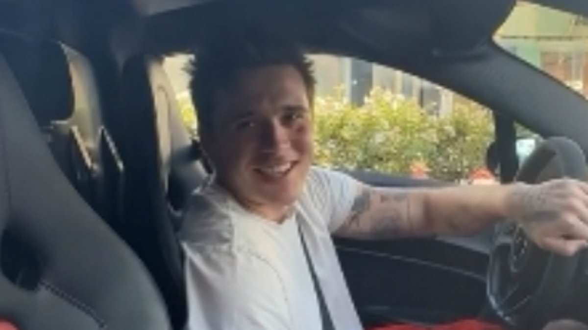 Brooklyn Beckham is criticised by fans as 2022 video of him driving a £1MILLION McLaren P1 supercar goes viral in the wake of family feud
