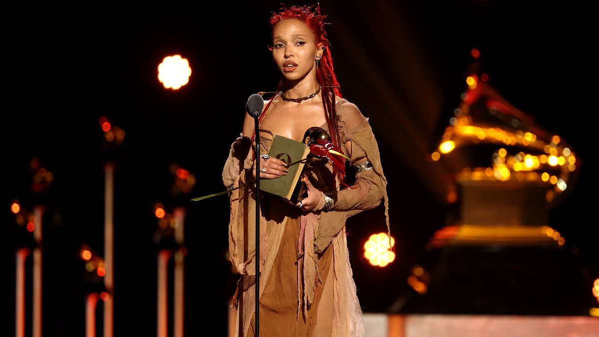 FKA Twigs pays an emotional tribute to beloved boyfriend Jordan Hemingway as she wins her first ever Grammy after turning heads on the red carpet