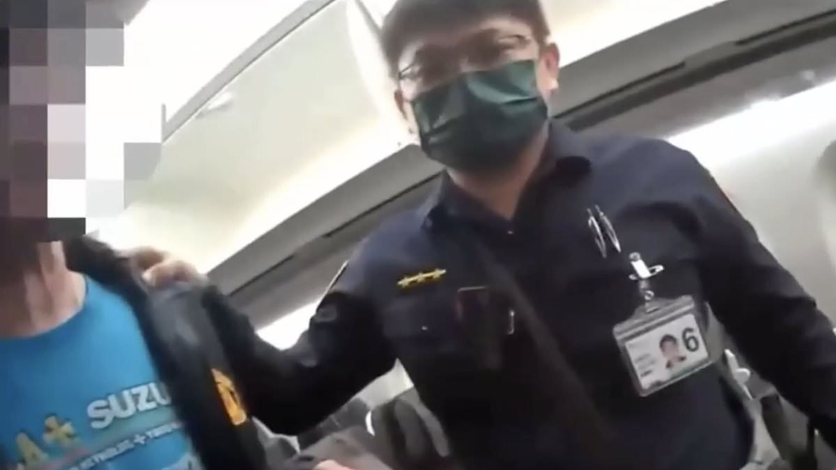Moment 'vaping' Brit passenger desperately apologises as he is thrown off plane for 'slapping cabin crew member's backside' during flight to Taiwan - then labels stewardess 'a paedophile'
