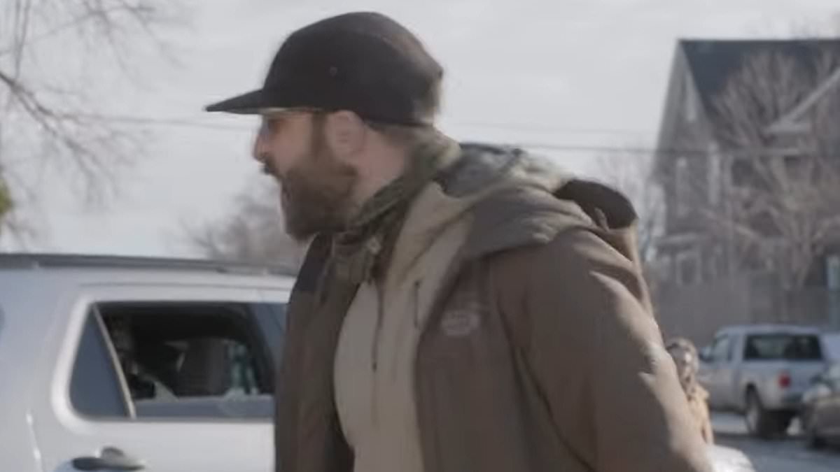 Anti-ICE protester believed to be Alex Pretti filmed spitting at federal SUV and kicking its tail light out 11 days before he was shot dead