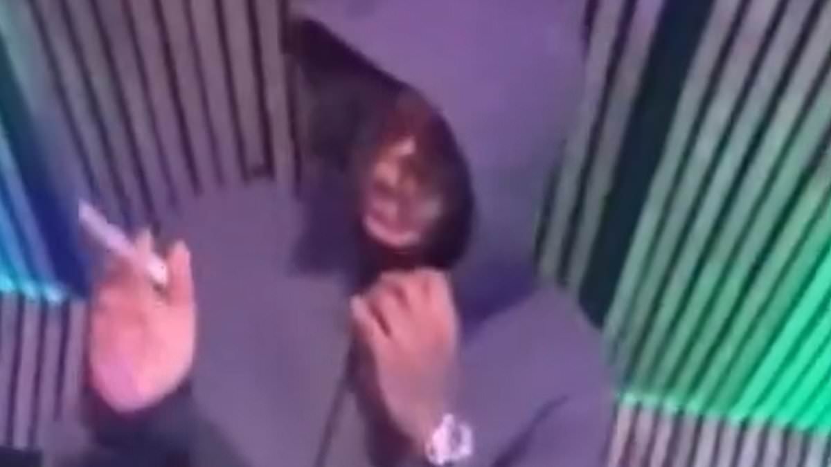 Joint-smoking fugitive boasts 'I'm free' in drill rap video after going on the run for the second time in a week ahead of deportation flight