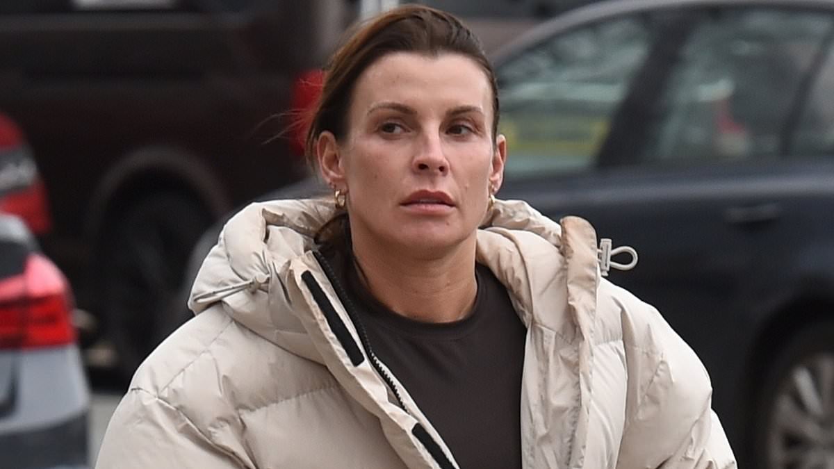Coleen Rooney steps out without her wedding ring as she is pictured for the first time since husband Wayne was seen partying with two mystery women