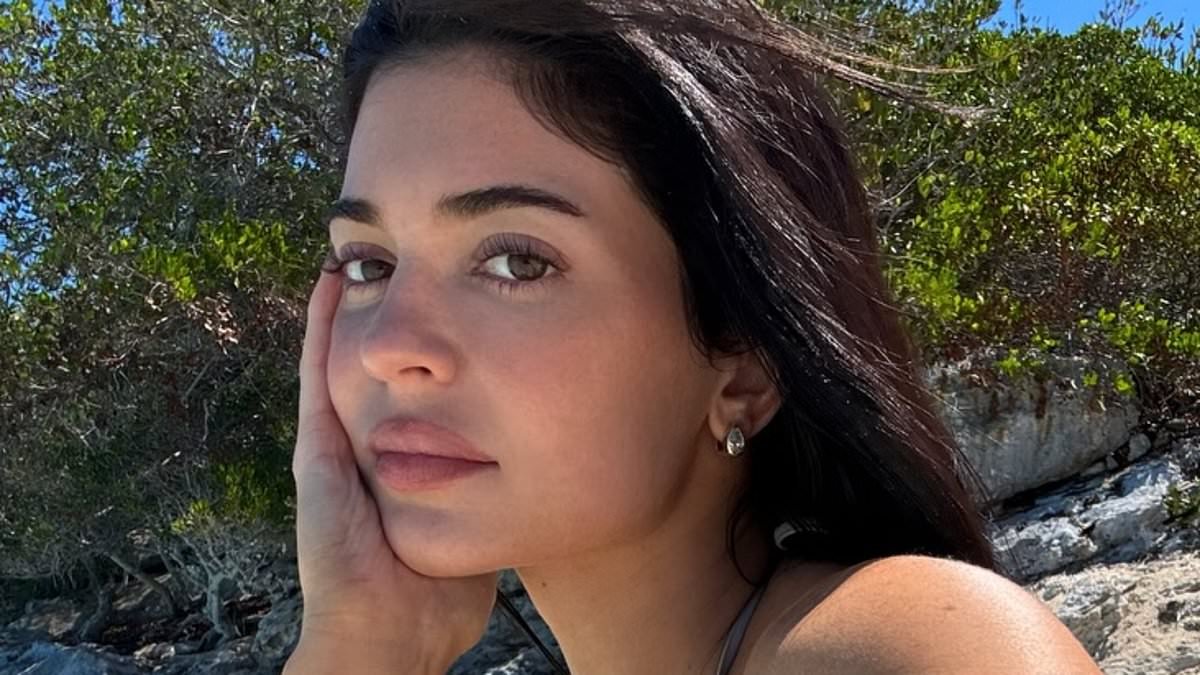 Kylie Jenner poses in a lingerie-inspired bikini as she vacations with beau Timothee Chalamet in 'heaven'