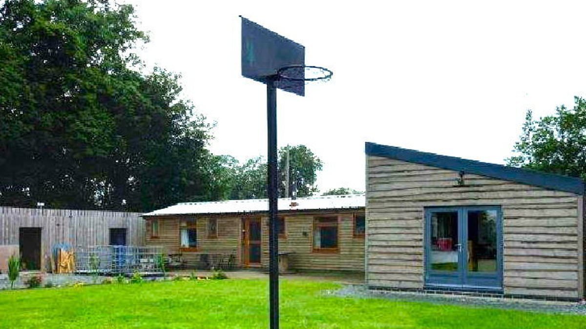 Father is jailed after refusing to bulldoze two countryside homes he built for his family without planning permission