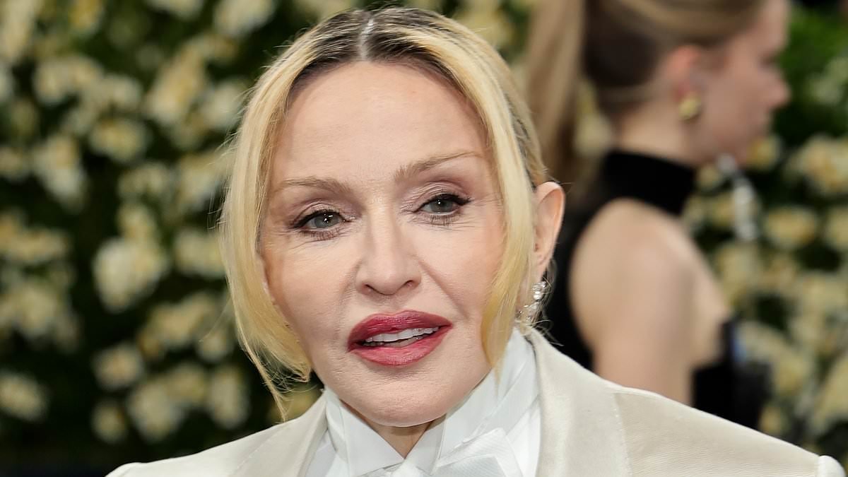 Madonna, 67, shocks fans with VERY tight face in new video alongside biopic star Julia Garner