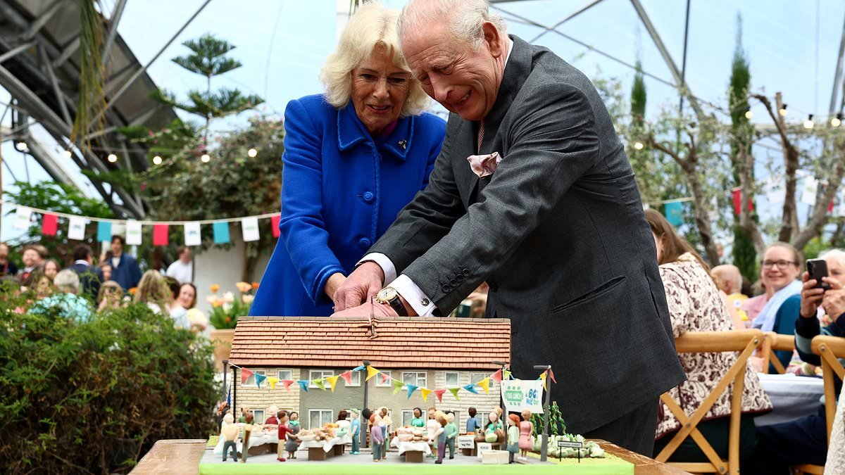 Mind your fingers! King and Queen use a sword to cut a slightly wonky slice of cake on visit to the Eden Project  
