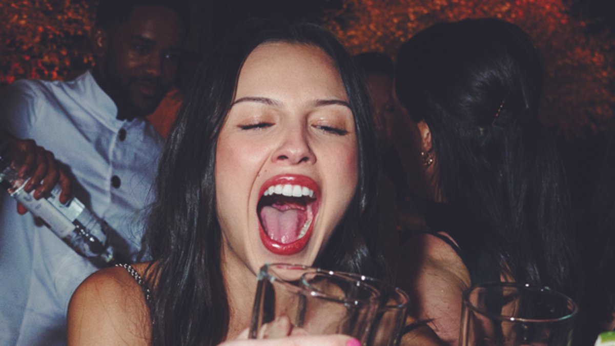 Jessie Buckley hugs 'tall drink of water' co-star Paul Mescal while Olivia Rodrigo necks tequila in intimate snaps from Vanity Fair Oscars party