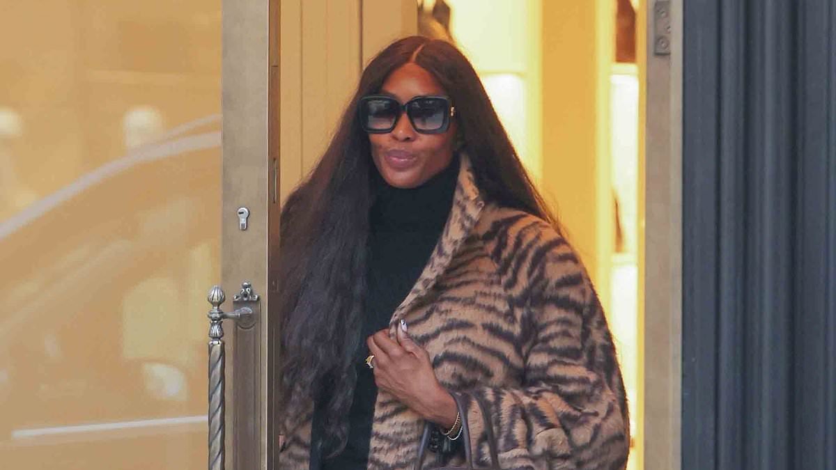 Naomi Campbell wraps up in animal print coat as she enjoys luxury shopping trip in Mayfair