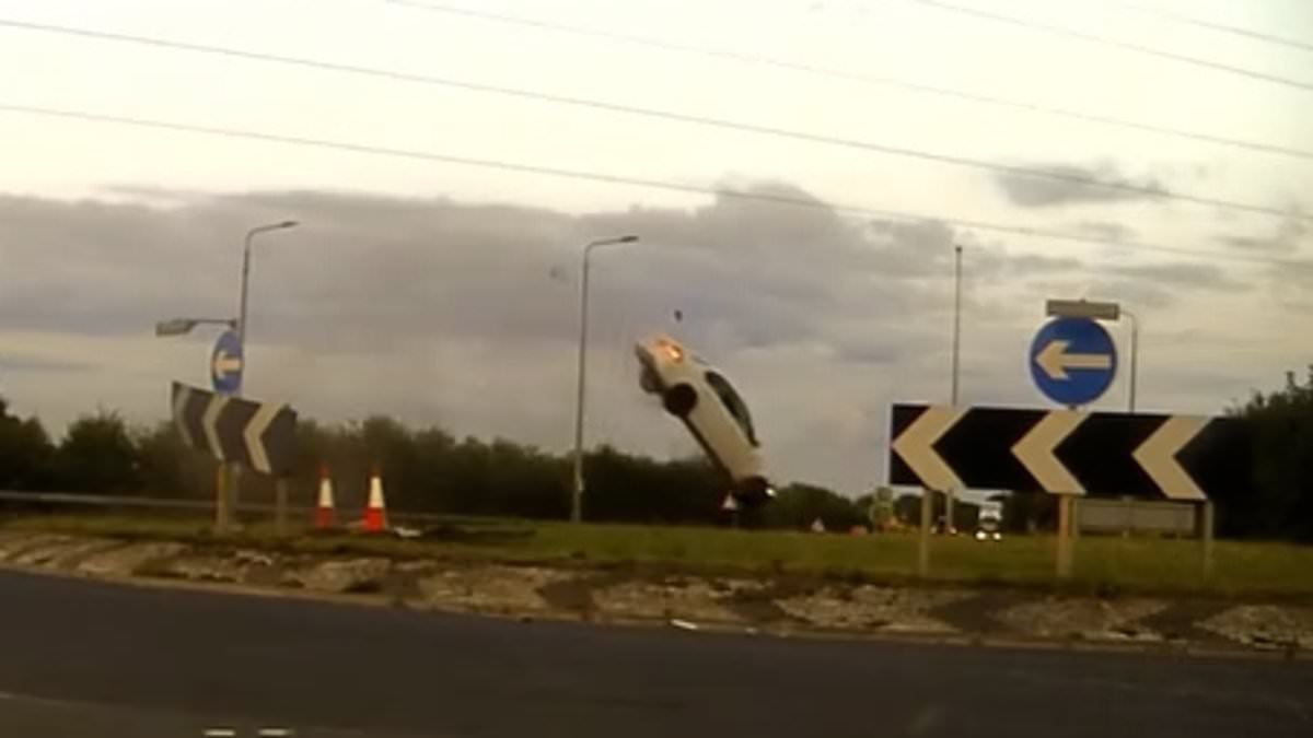 Moment drug-driver leads police on 140mph chase before BMW crashes into roundabout and somersaults through the air