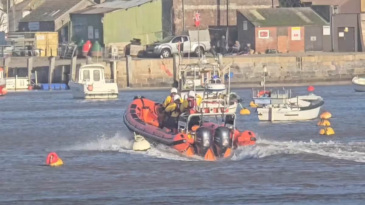 Body is recovered in search for two men who got into trouble during Christmas Day swim